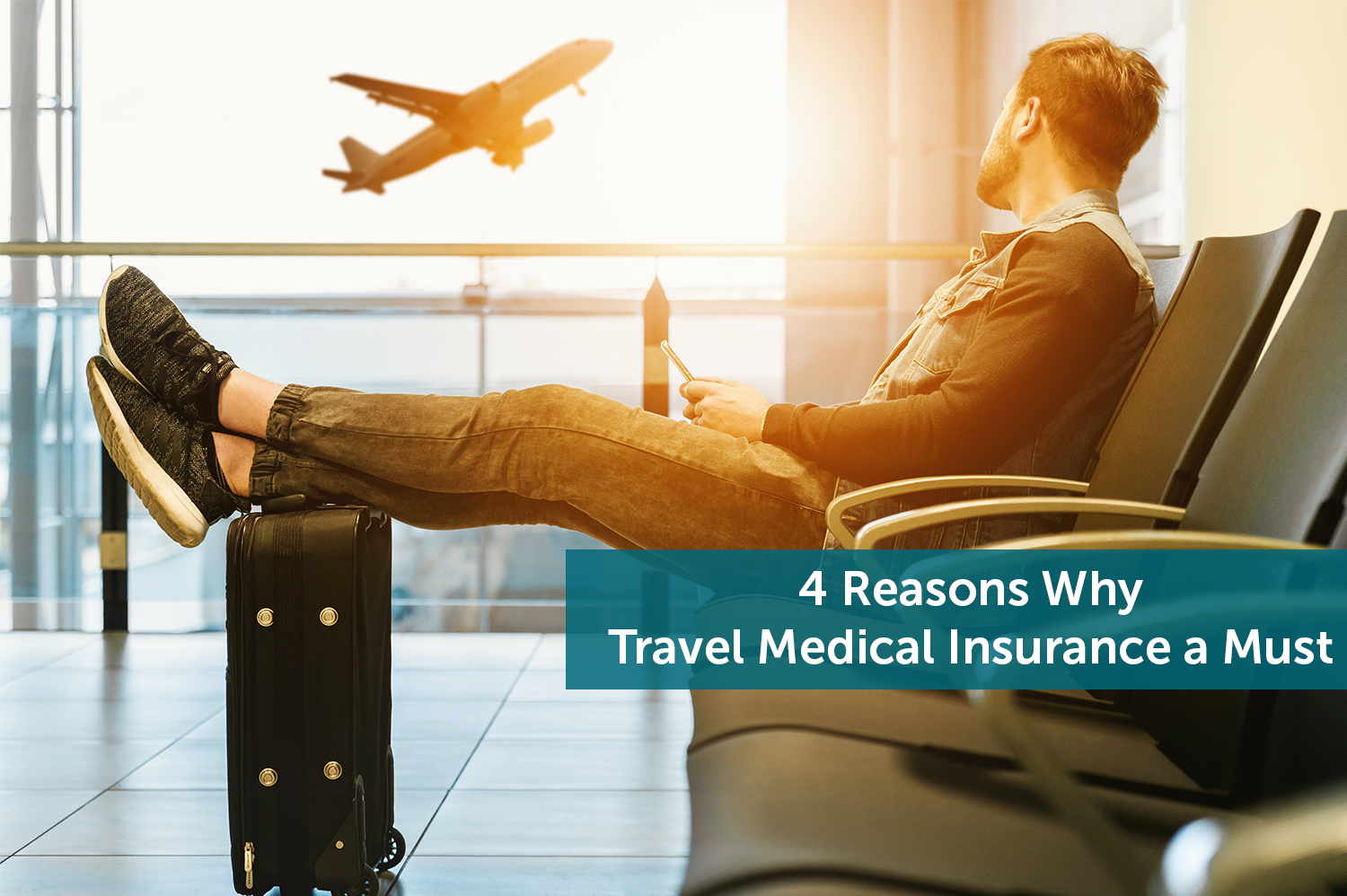 Anonymous man at airport, watching a plane take off, ready for his trip with travel medical insurance.